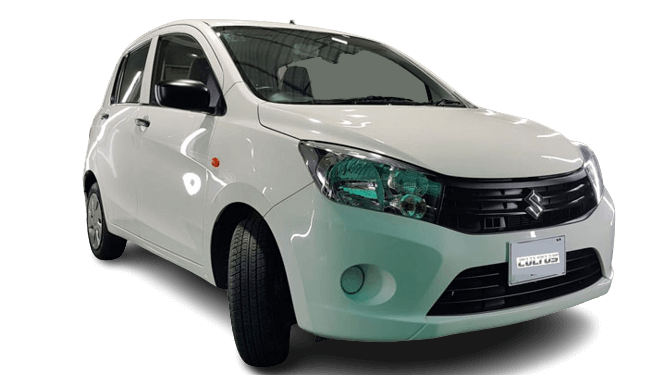 White Suzuki hatchback ready for workshop inspection in Dubai