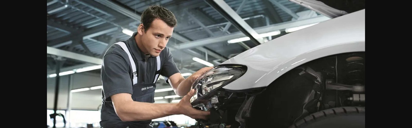 BMW panel preparation and paint repair in a body shop