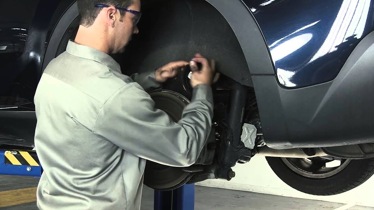 BMW suspension components being checked