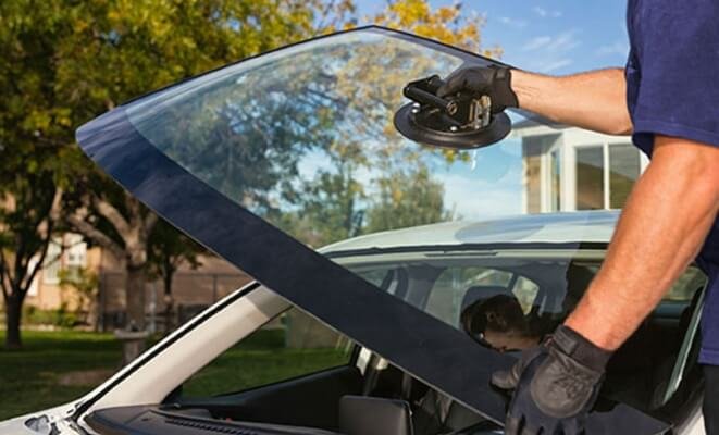 Bentley glass fitting service at an Al Quoz workshop