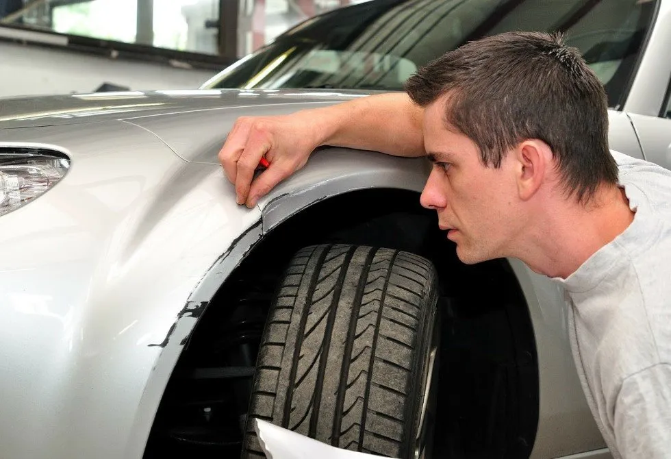 Cadillac dent repair inspection in Dubai