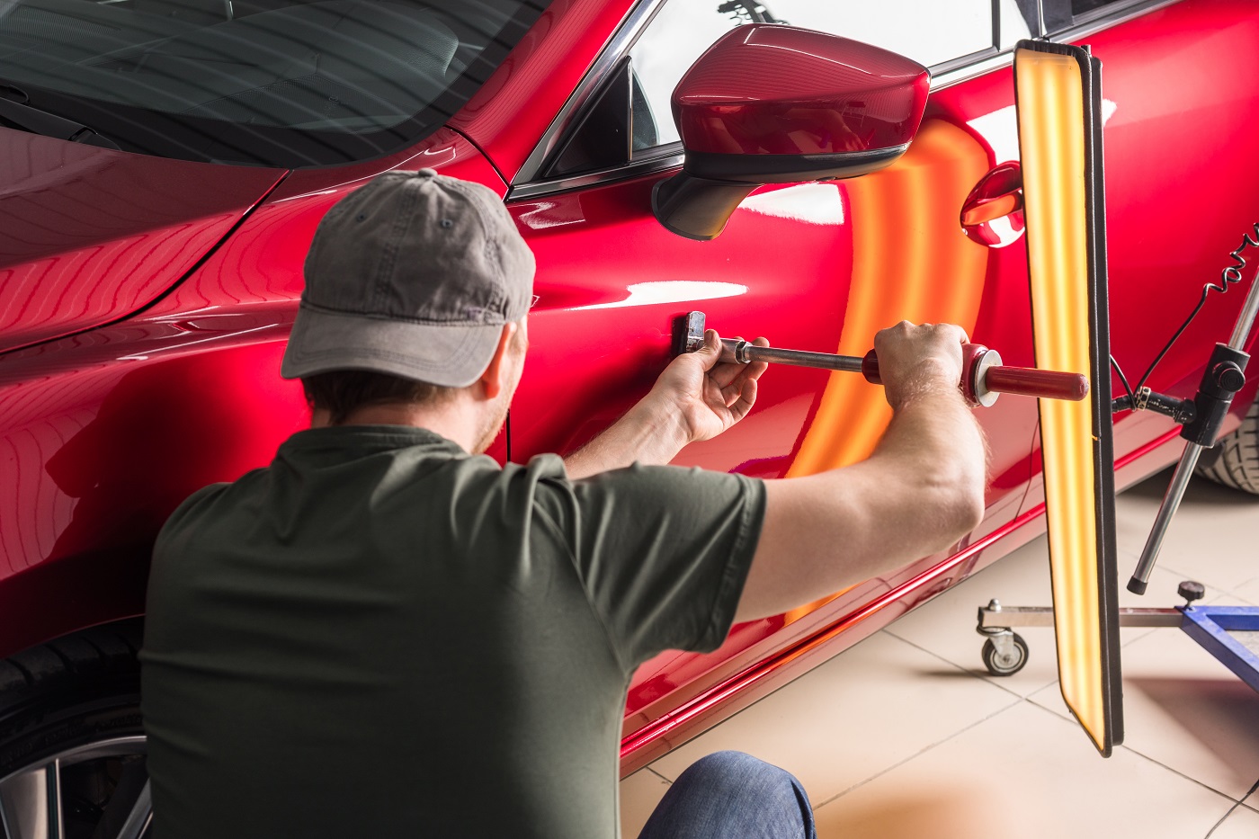 Paintless dent removal assessment on a Mercedes body panel