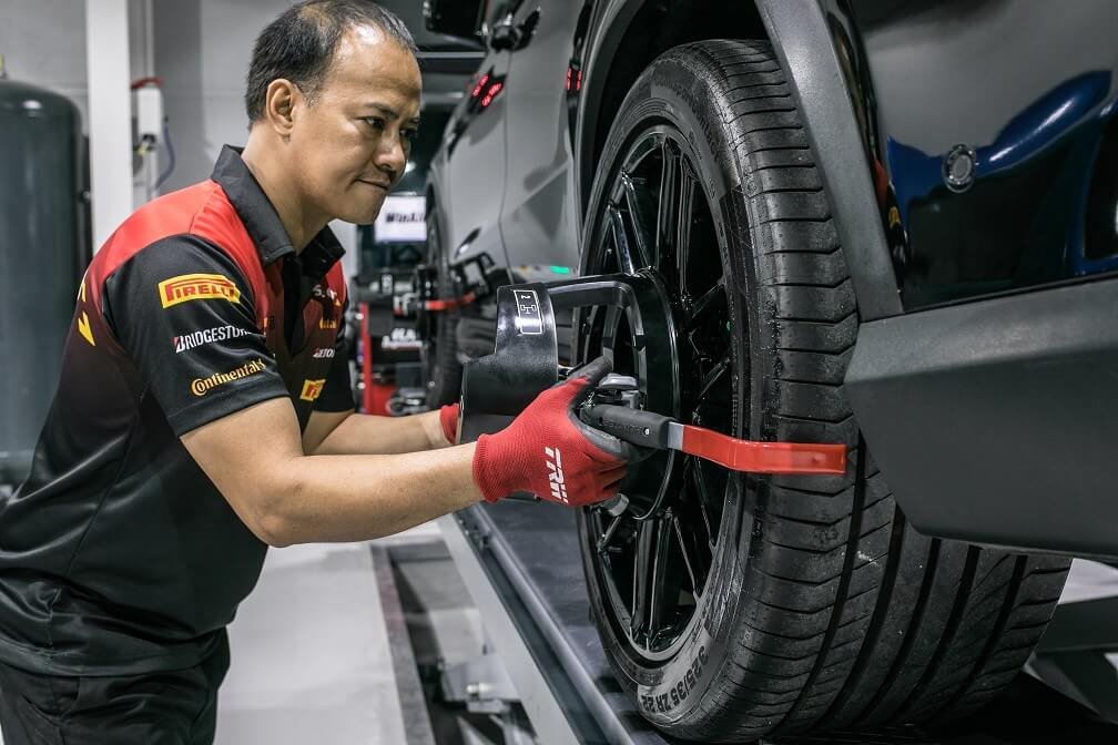 Ferrari tire fitting and wheel inspection in Dubai
