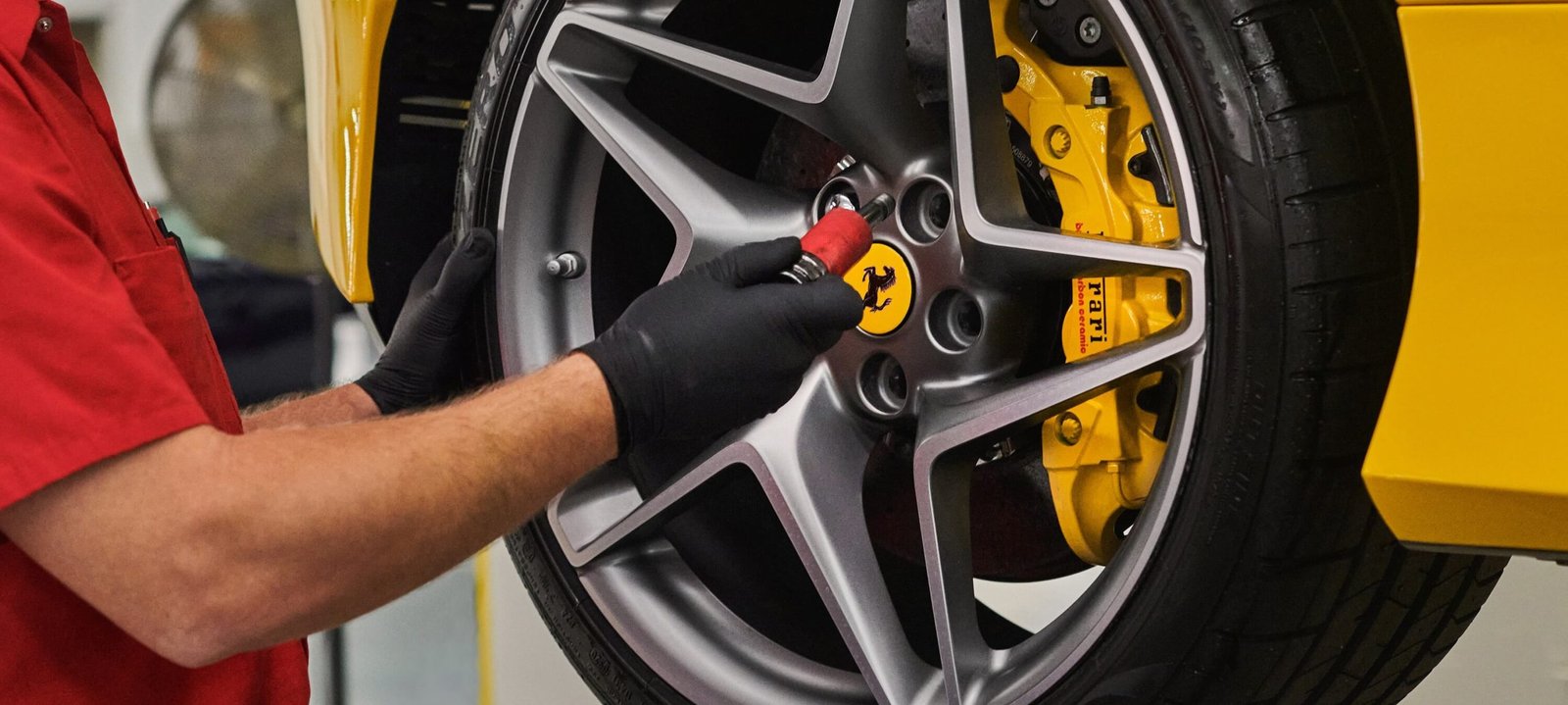 Ferrari alloy wheel inspected for rim repair in Dubai