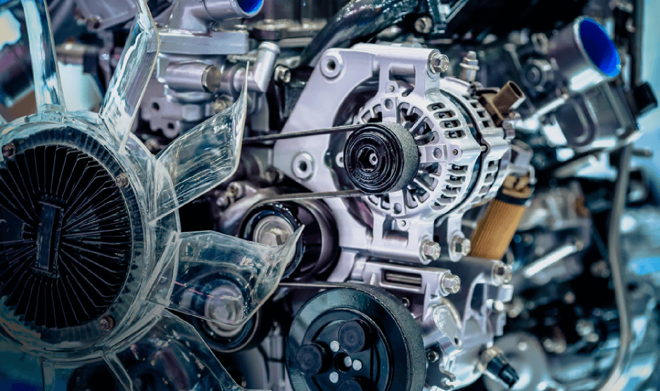 Technician comparing old and new Maserati suspension components