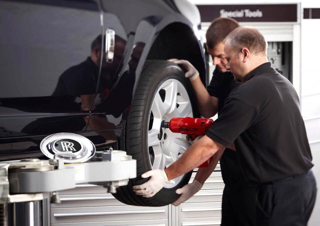 Rolls-Royce wheel prepared for rim inspection and repair in Dubai