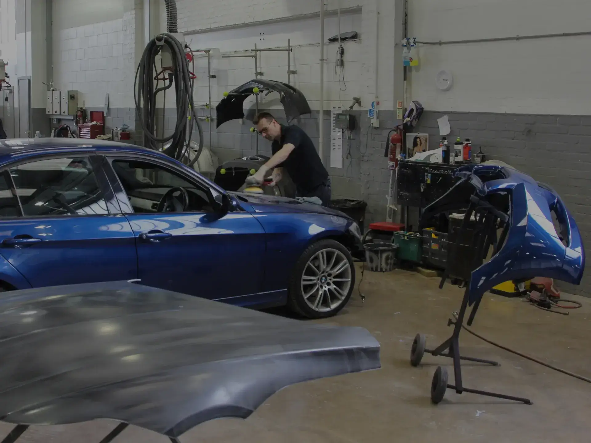 BMW body panel repair underway in a workshop