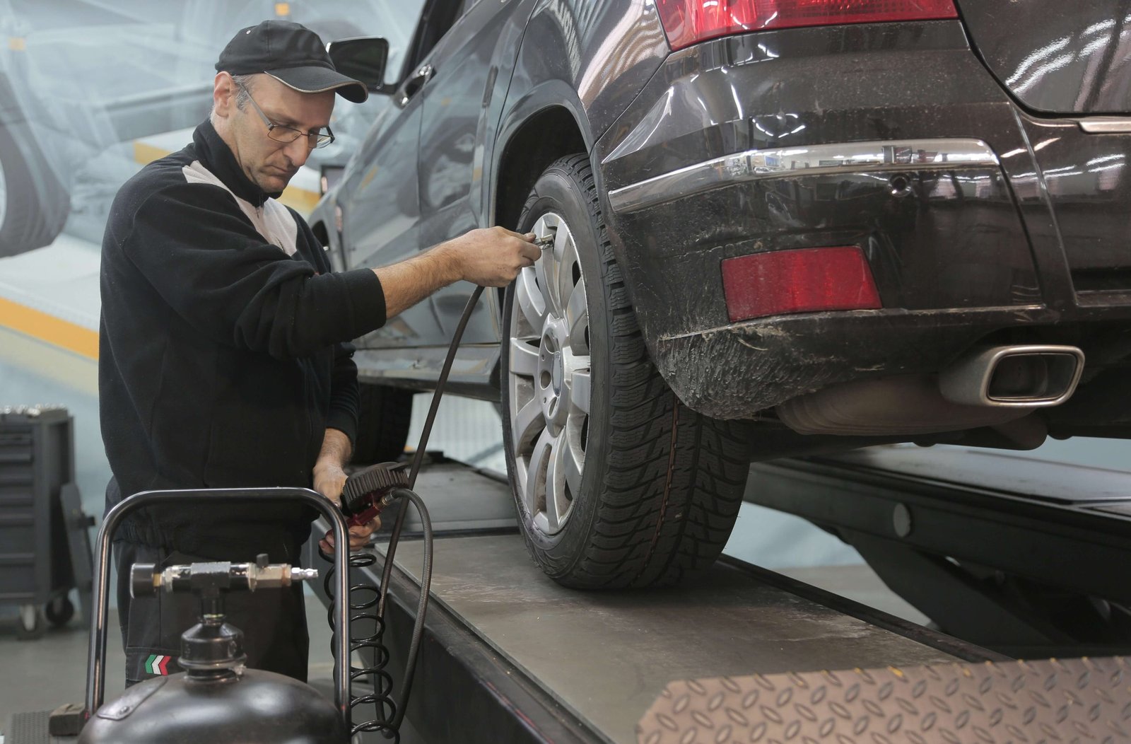 Mercedes receiving collision damage assessment in a body repair workshop