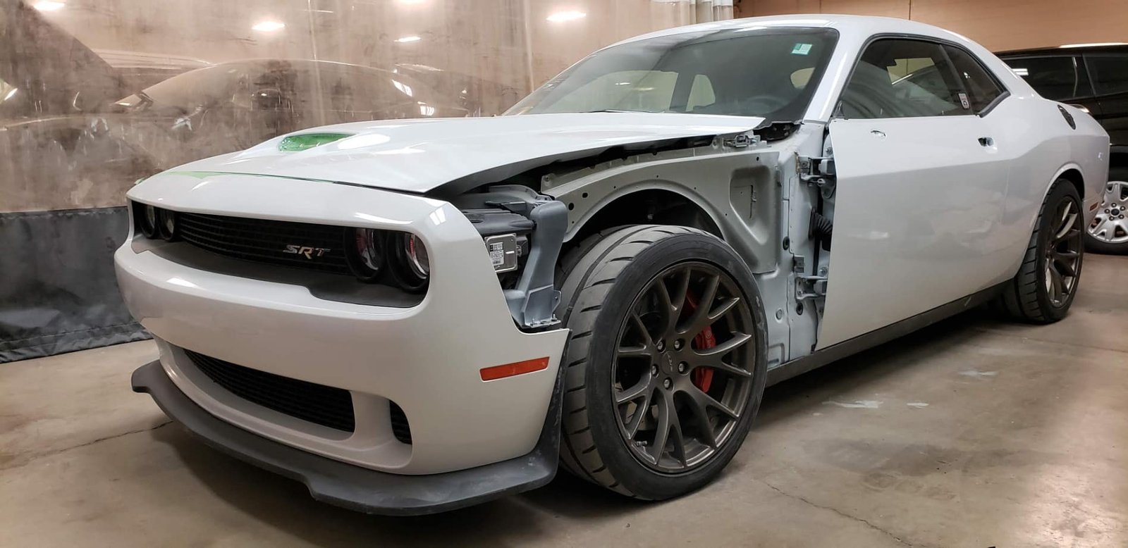 Dodge vehicle prepared for accident damage inspection in Dubai