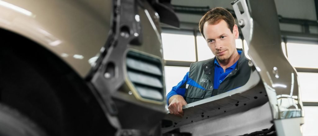 Ford accident body panels aligned in a Dubai workshop