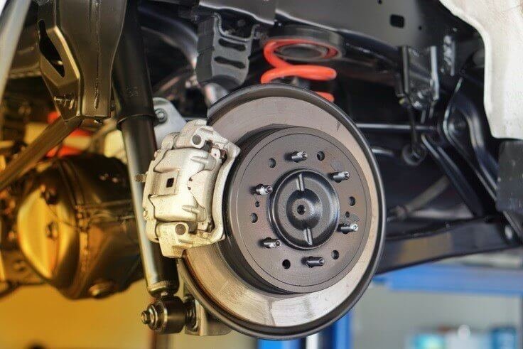 Ford brake caliper and rotor service