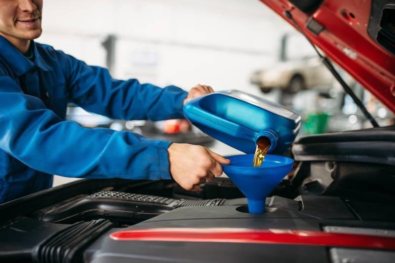 Oil level inspection during Rolls-Royce servicing