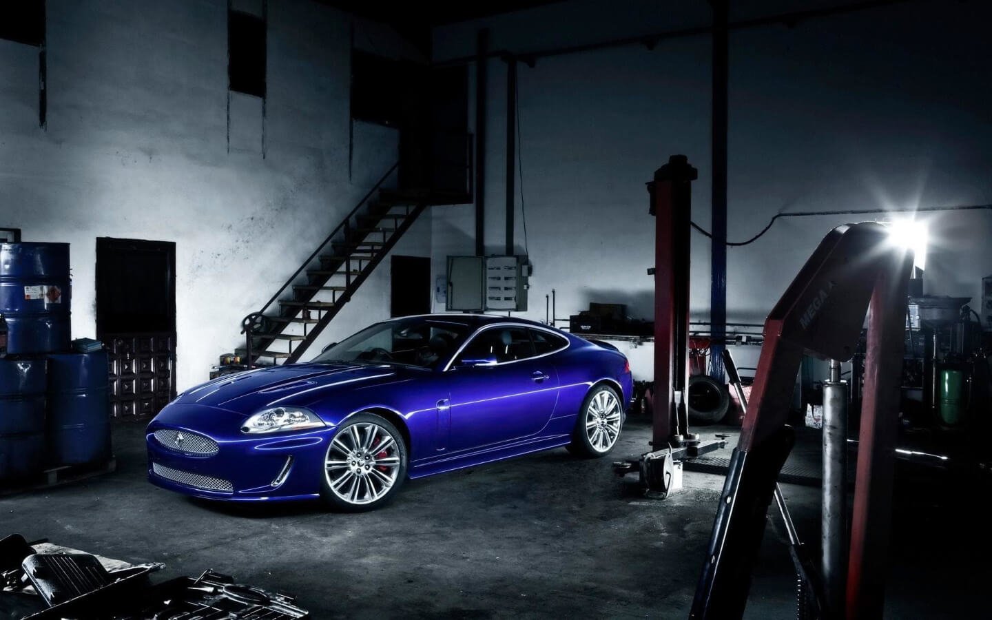 Jaguar in a Dubai workshop for suspension inspection