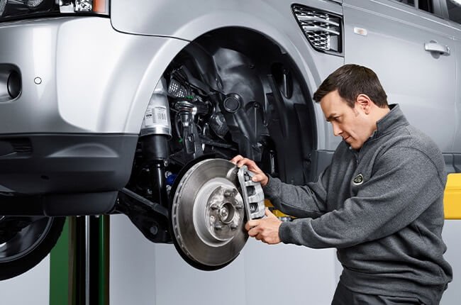 Land Rover brake repair inspection in a Dubai workshop