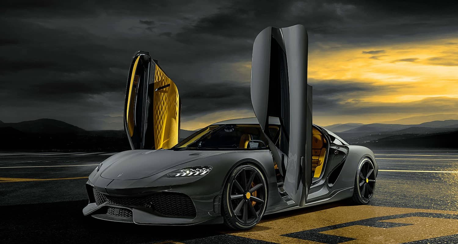 Gray Koenigsegg with both doors raised