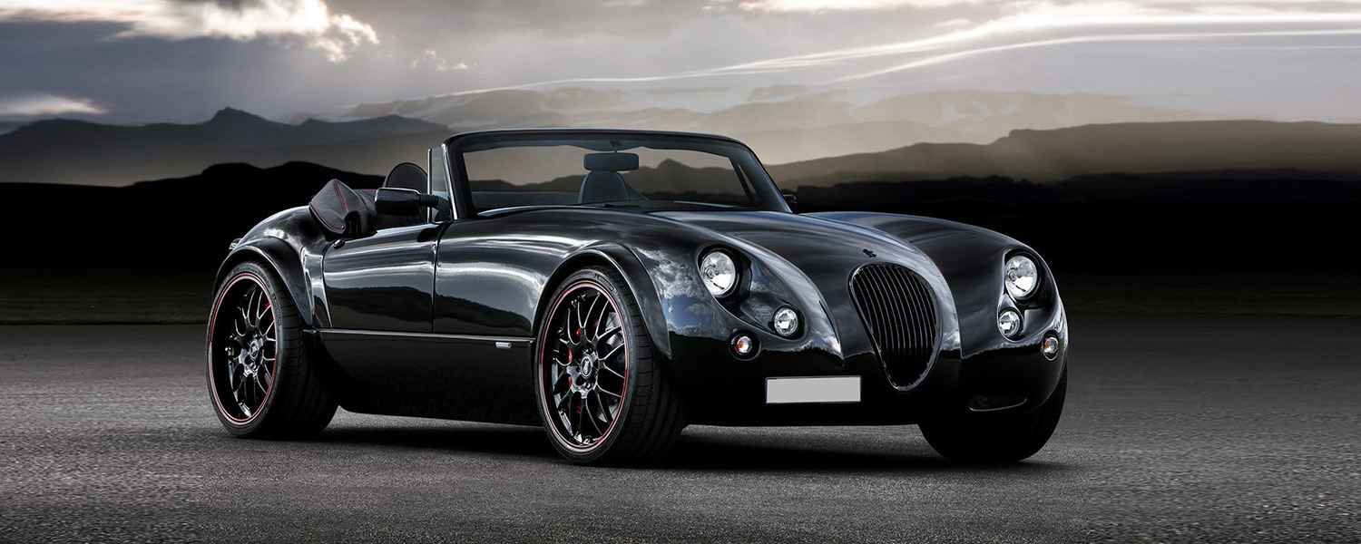 Black Wiesmann roadster viewed from the front