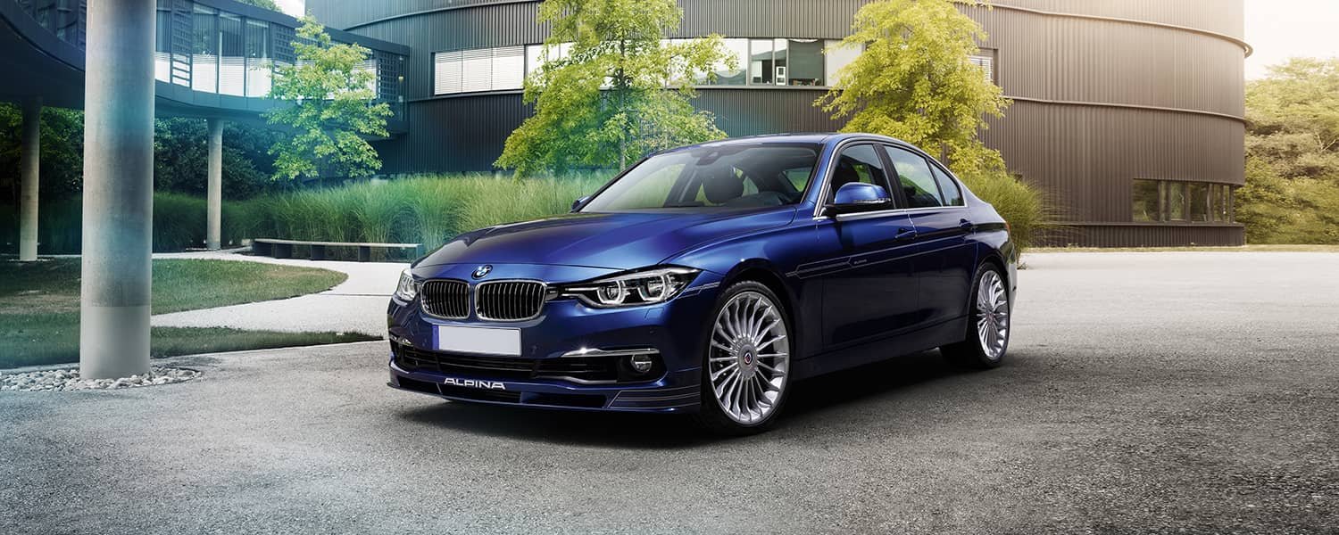 Blue Alpina vehicle prepared for repair assessment in Dubai