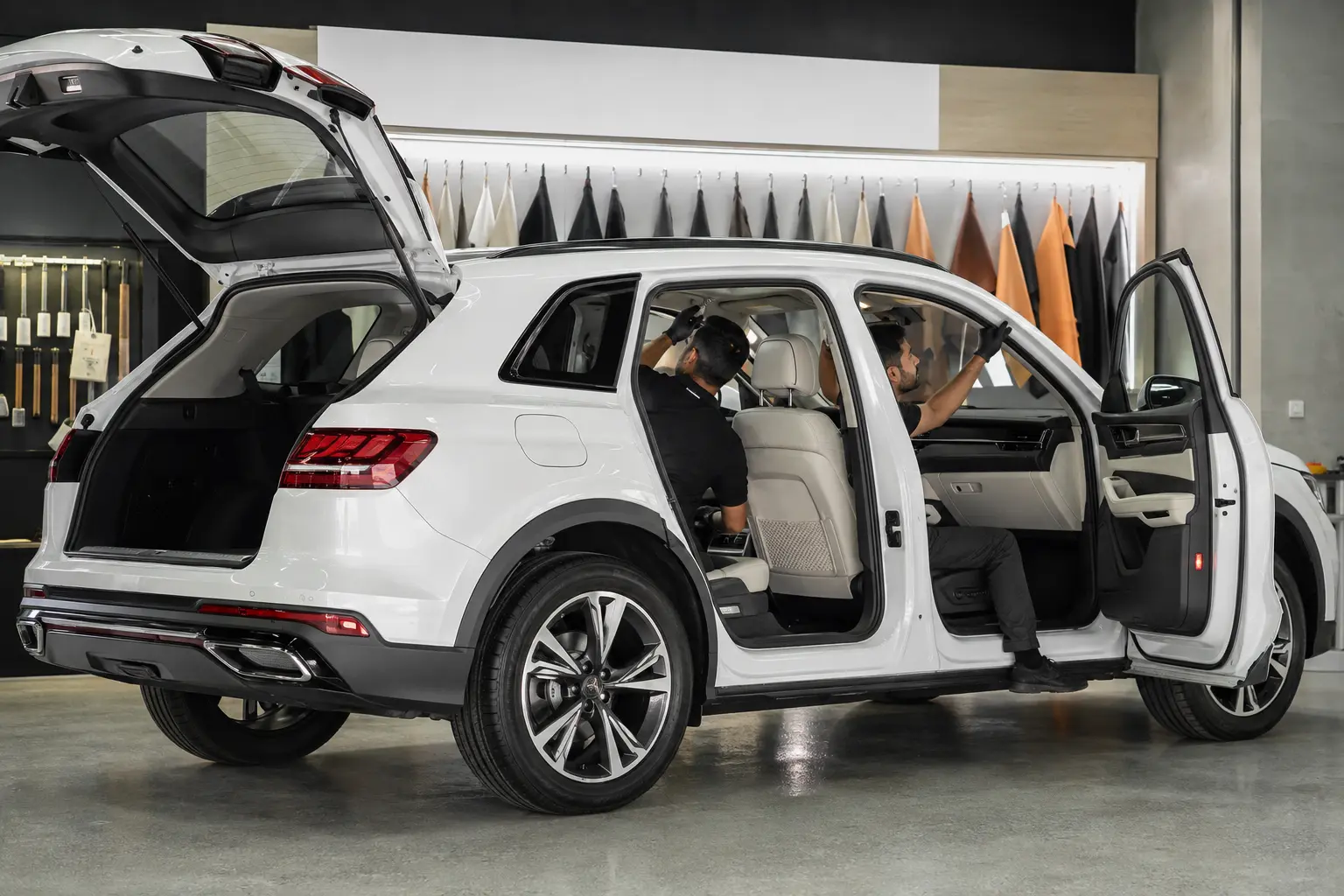 Luxury SUV headliner and pillar trim receiving alignment inspection
