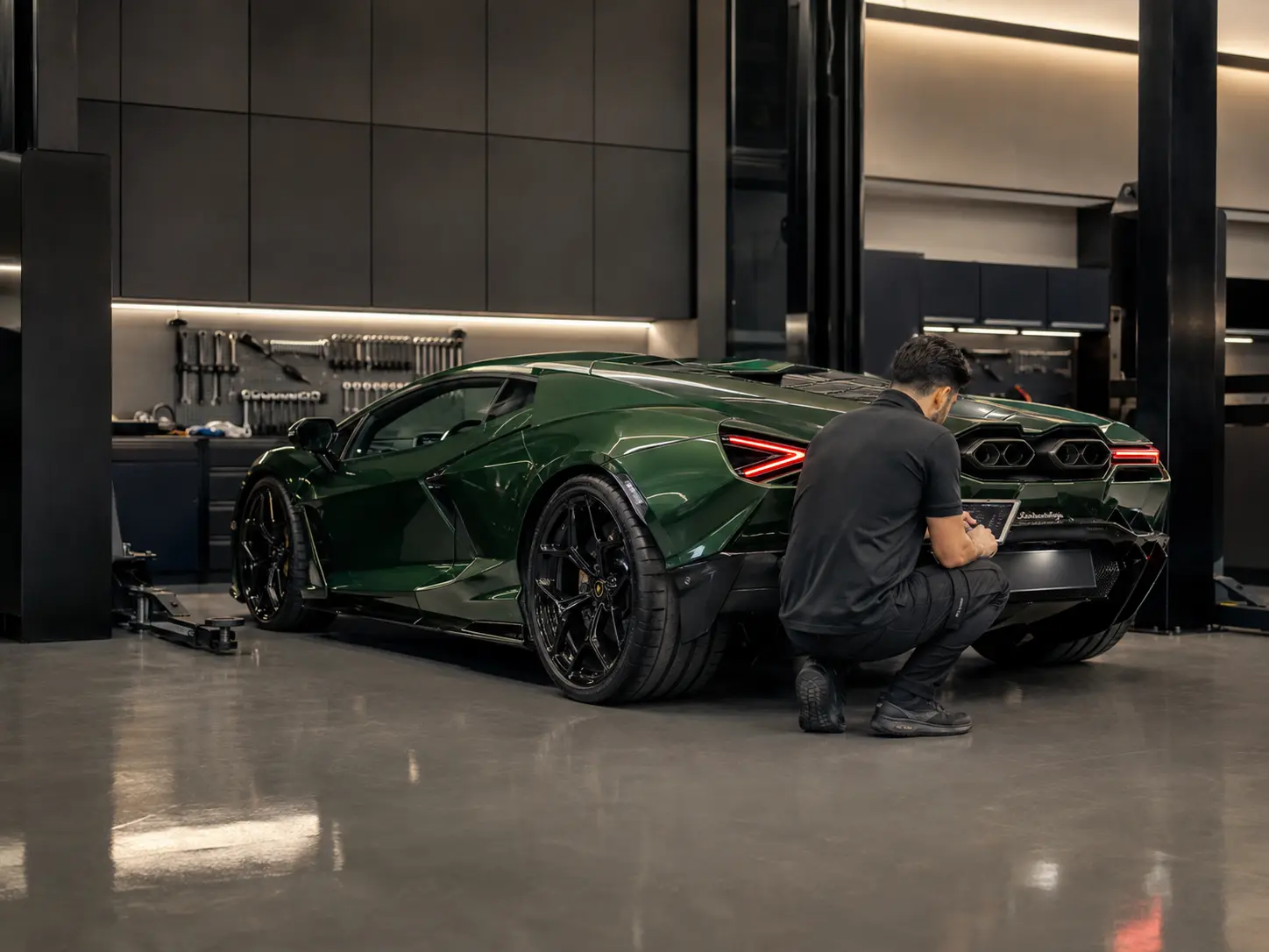 Lamborghini Revuelto final diagnostic scan in a workshop handover bay