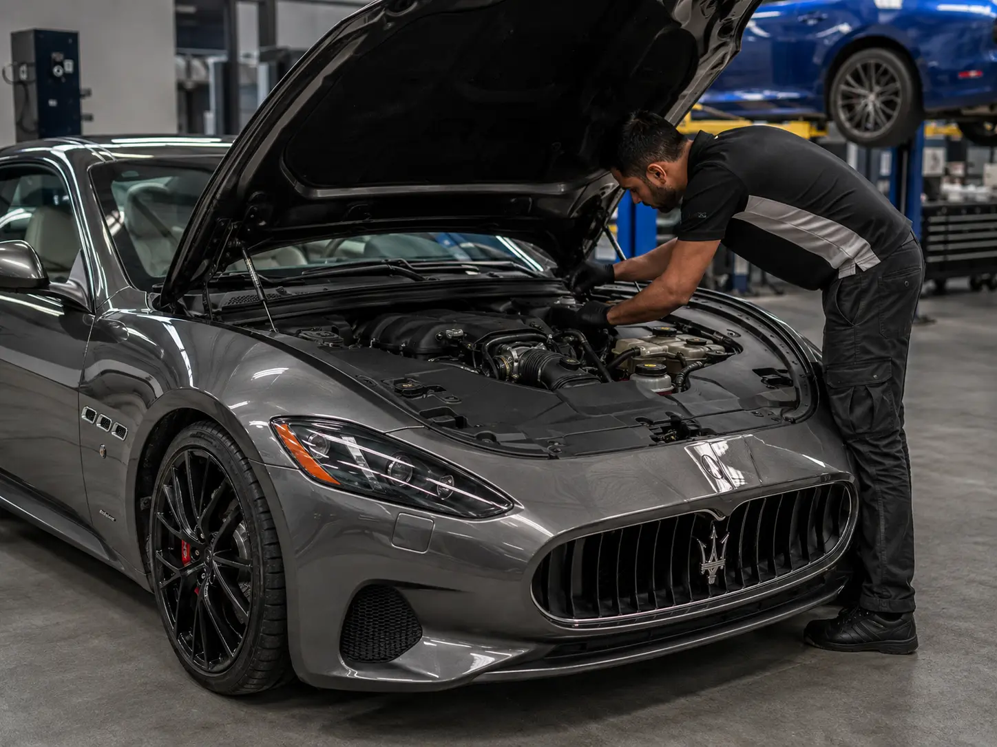 Maserati GranTurismo engine bay used to illustrate inspection access